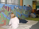 Children of Tarland School painting the River Dee Mural 